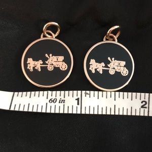 Two coach charms
